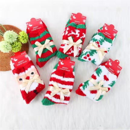 Christmas-themed fluffy socks with festive patterns, tied with elegant ribbon bows, in red, green, and white colors.